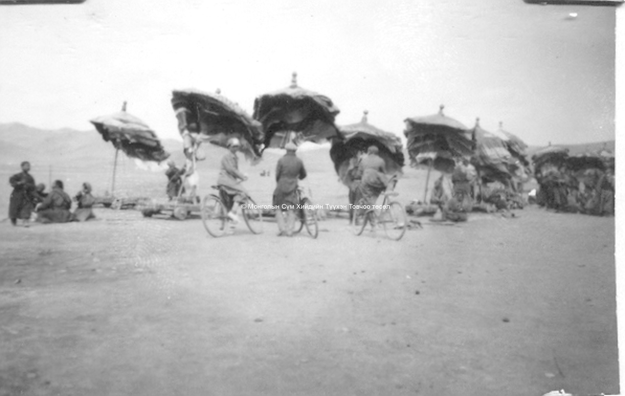 Umbrellas of the 30 aimags at Maitreya procession. Film Archives K-24804. Forbáth, L., A megujhodott Mongolia, Franklin. A Magyar Földrajzi Társaság Könyvtára. Budapest 1934. p. 56. Umbrellas of the 30 aimags at Maitreya procession. Film Archives K-24804. Forbáth, L., A megujhodott Mongolia, Franklin. A Magyar Földrajzi Társaság Könyvtára. Budapest 1934. p. 56.